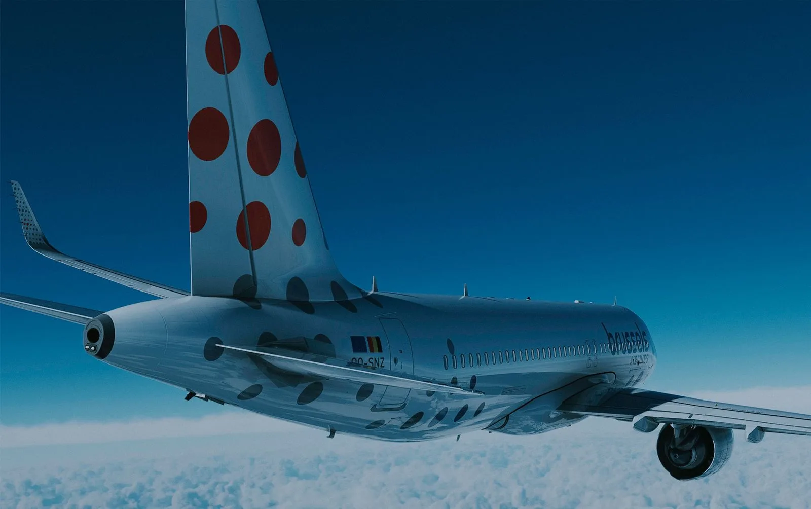 Brussels Airlines aircraft flying above the clouds.
