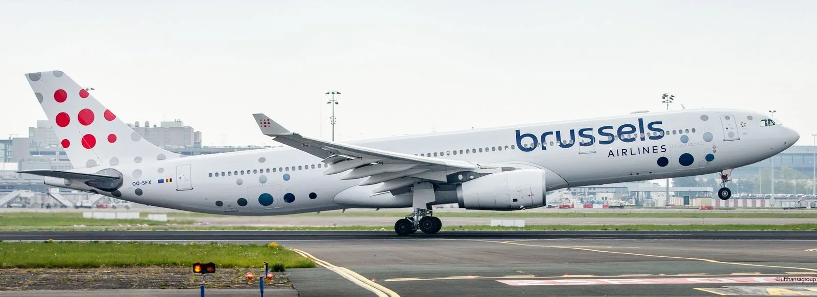 Brussels Airlines aircraft on the runway.